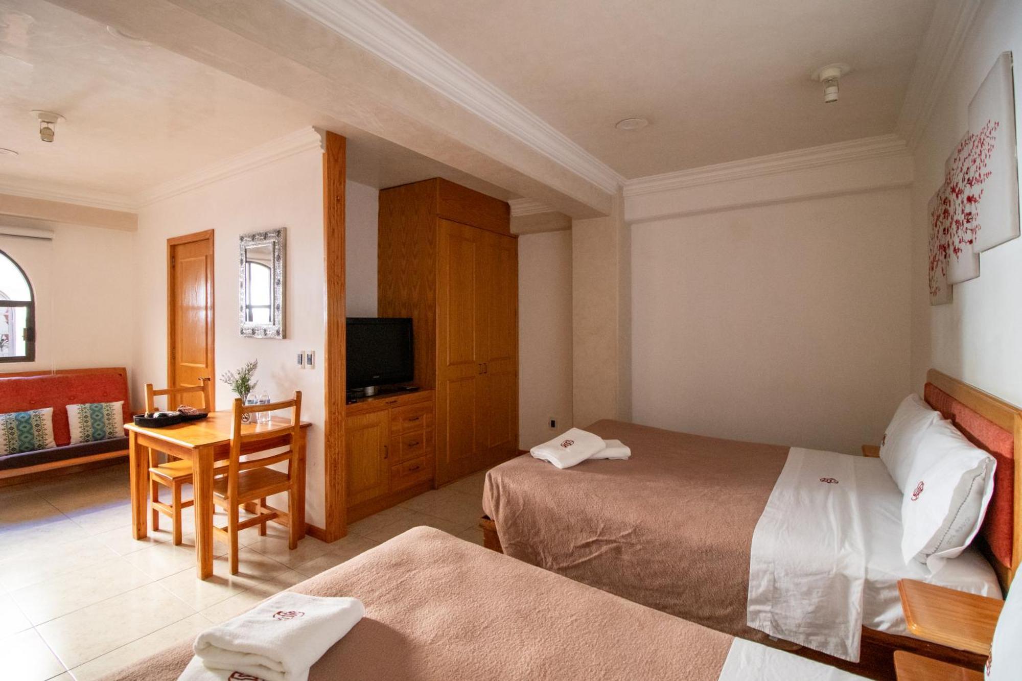 Suites Sevilla بويبلا المظهر الخارجي الصورة