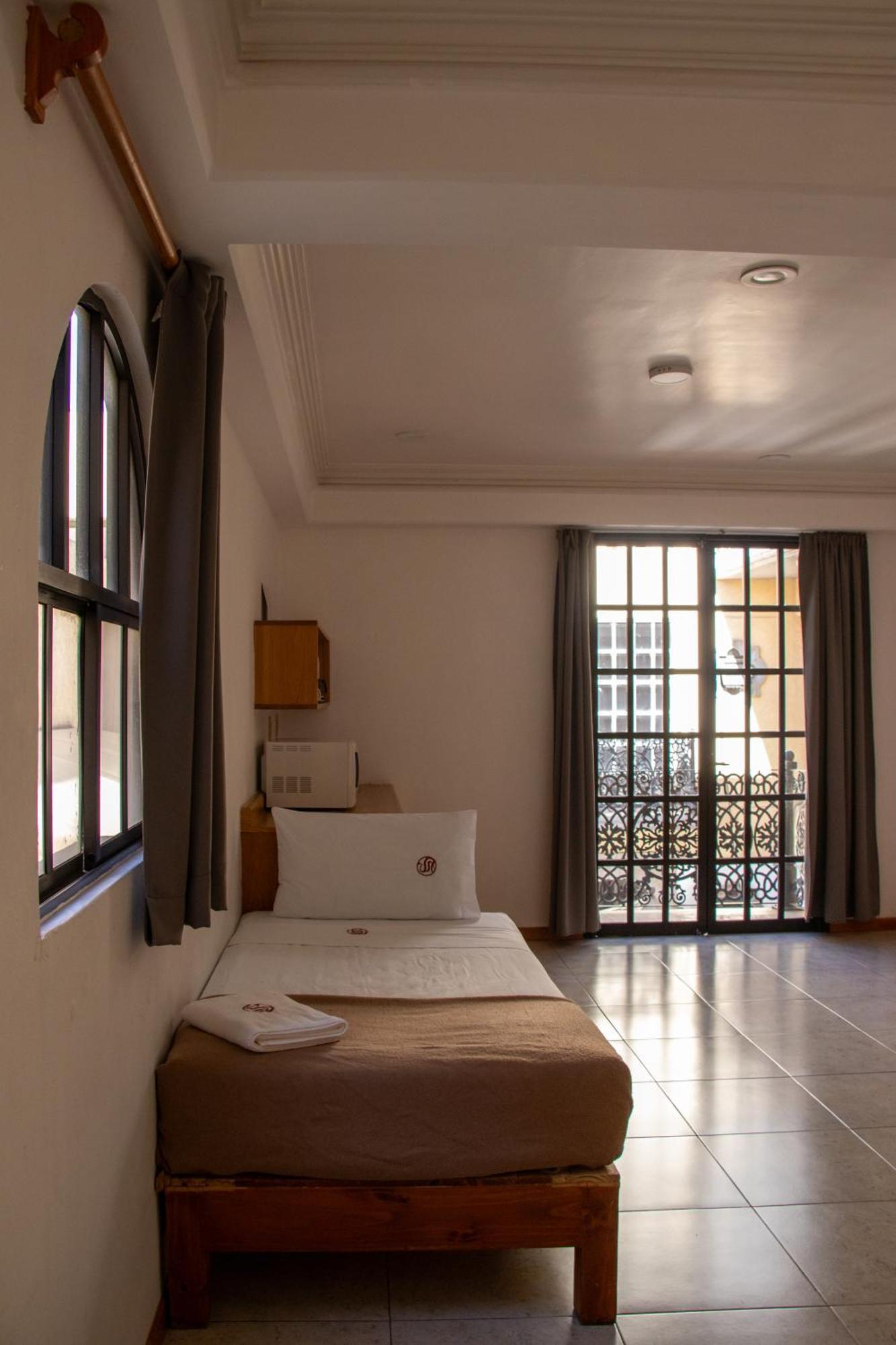 Suites Sevilla بويبلا المظهر الخارجي الصورة