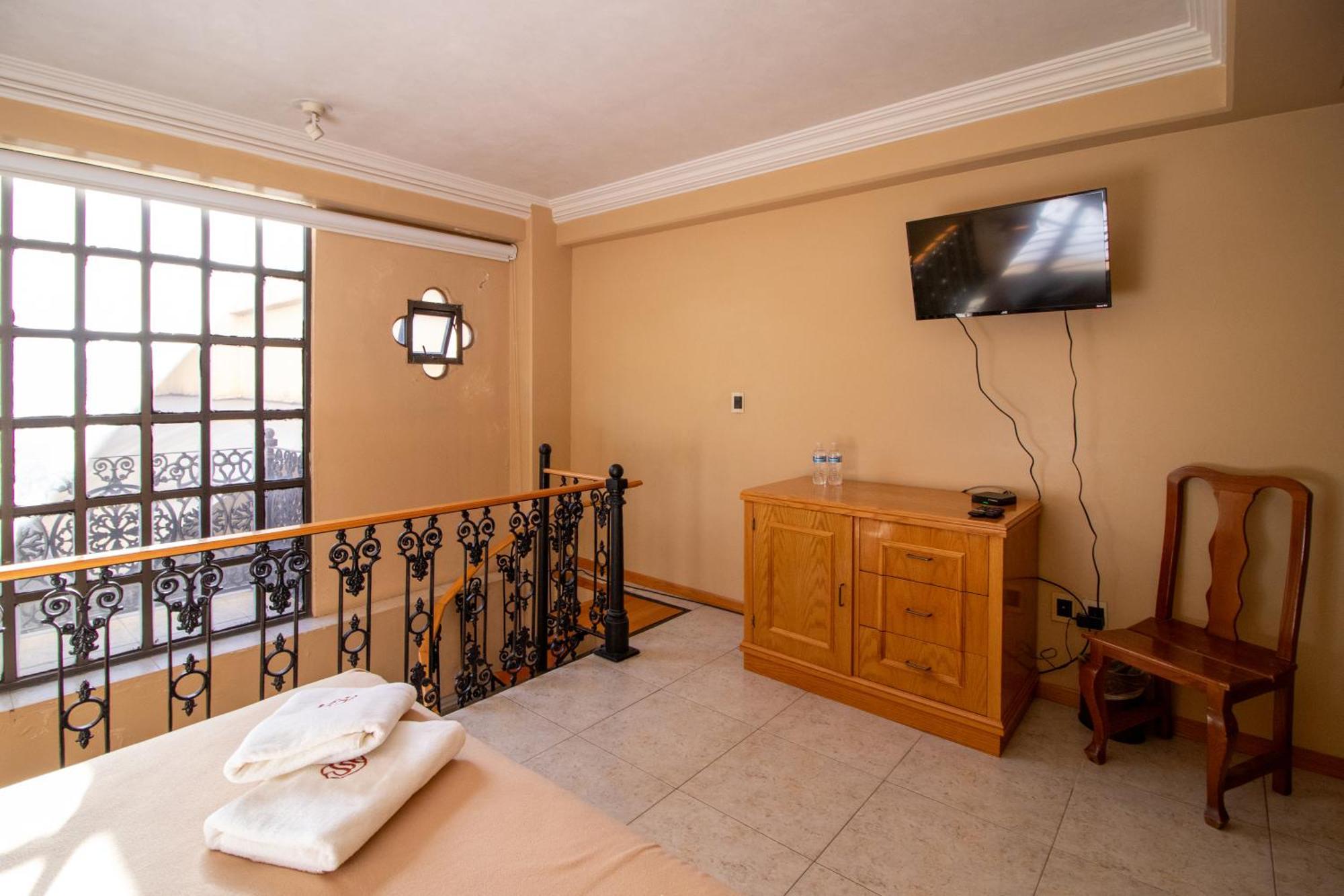Suites Sevilla بويبلا المظهر الخارجي الصورة