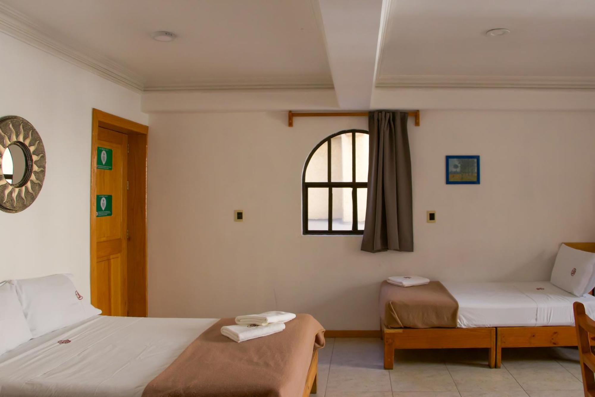 Suites Sevilla بويبلا المظهر الخارجي الصورة