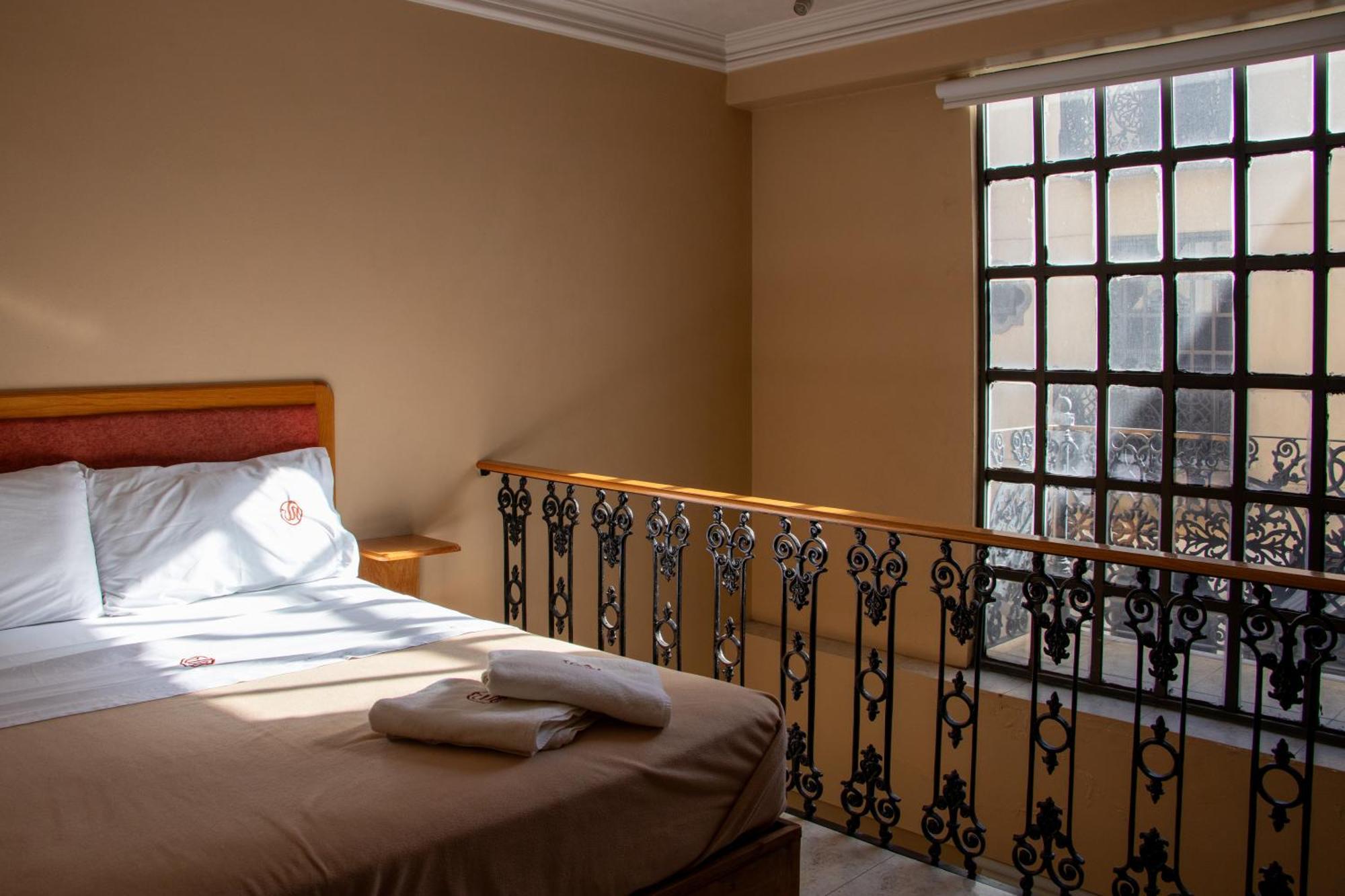 Suites Sevilla بويبلا المظهر الخارجي الصورة